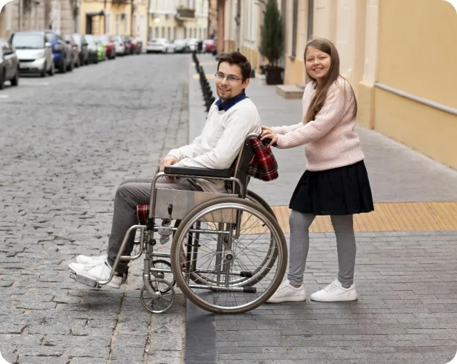 girl-helping-disabled-man-traveling-city@2x
